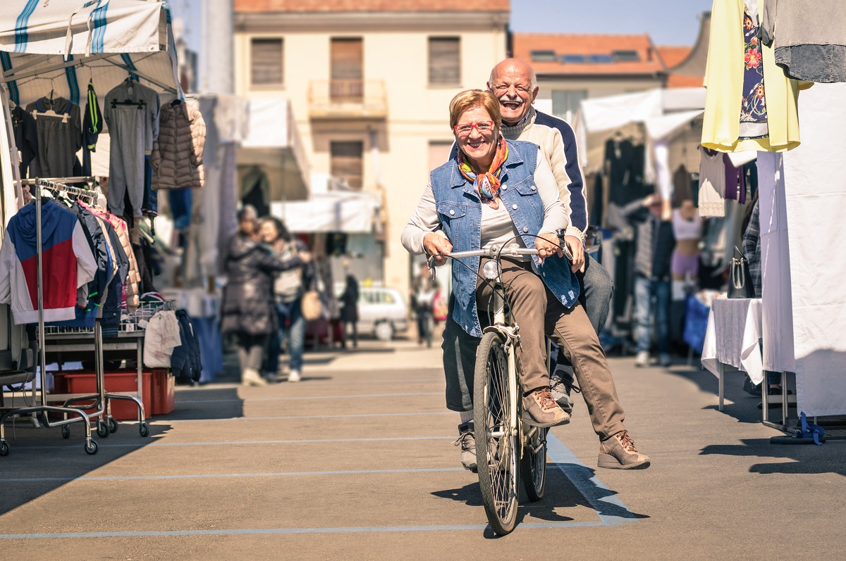 senior couple riding a bike