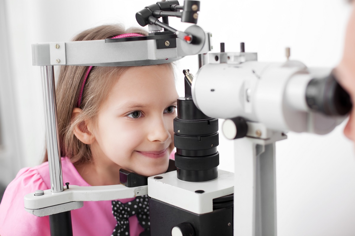 Girl getting her eyes checked