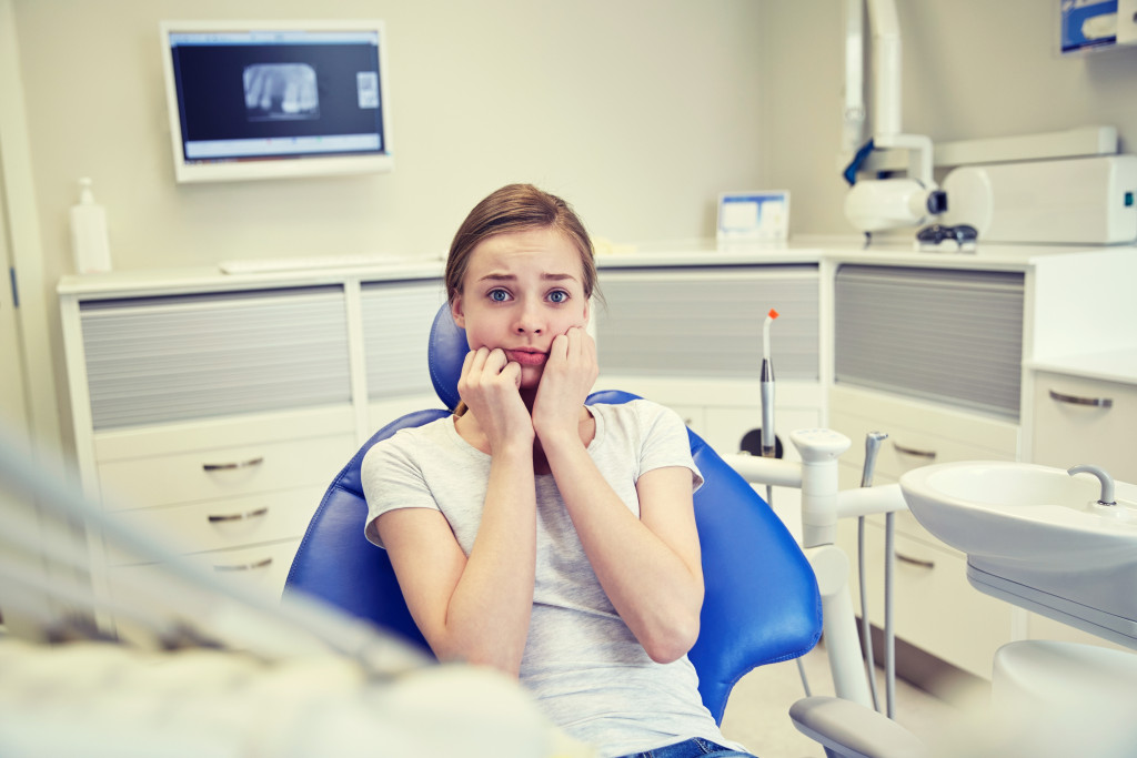 dental patient in the clinic with tooth sensitivity