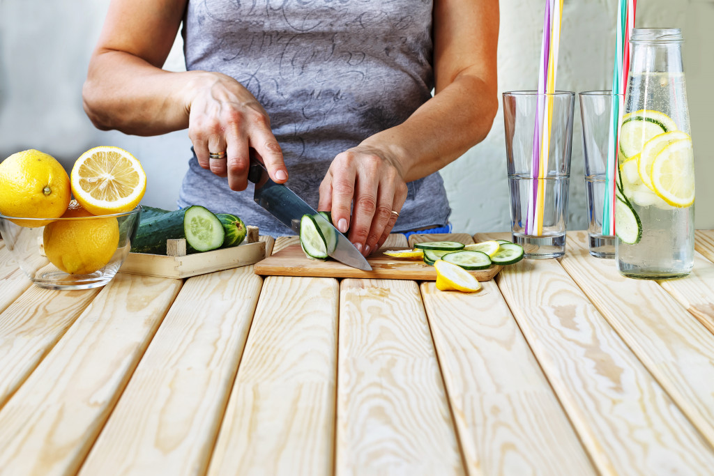 woman cutting fruit