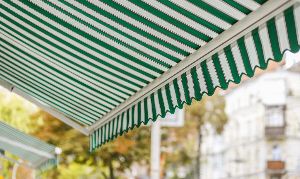 white and green awnings