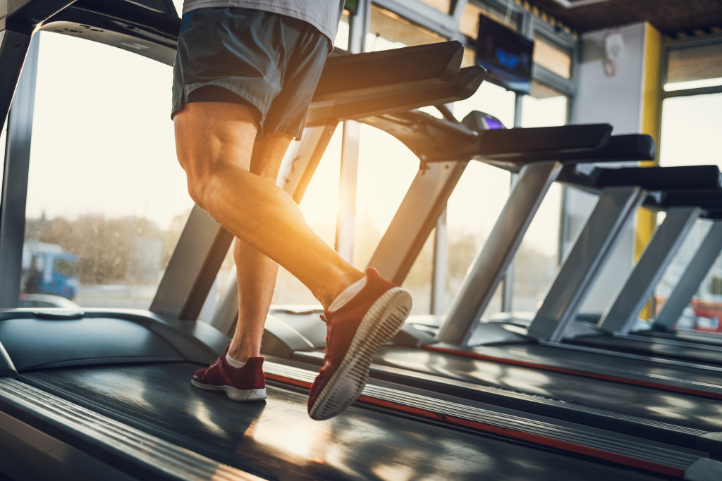 man exercising in treadmill