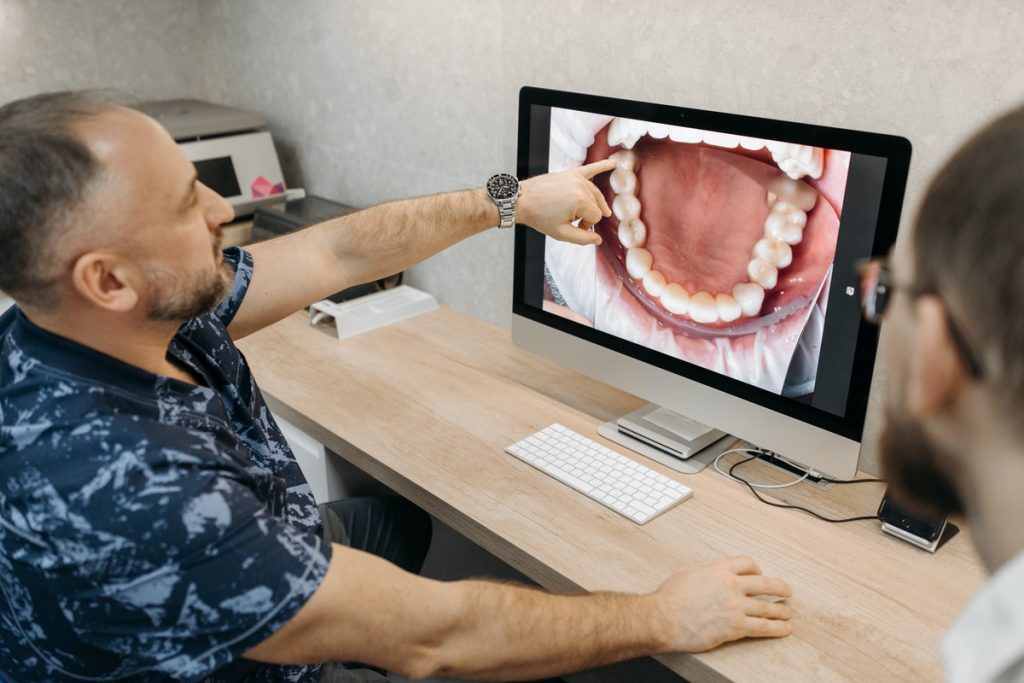 dentist teeth check up on a computer
