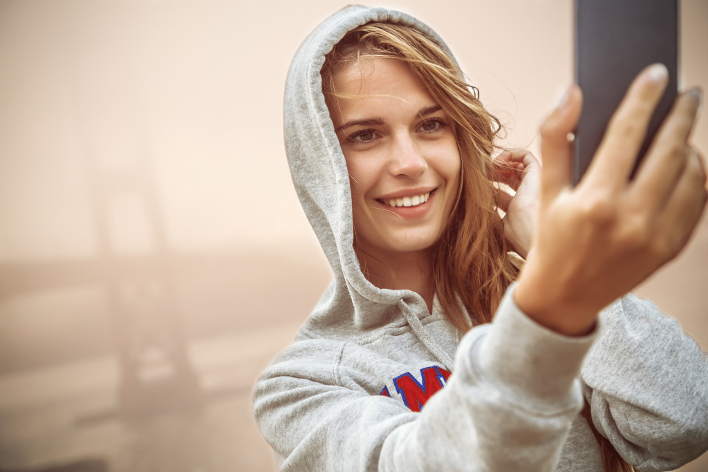 A woman taking a selfie