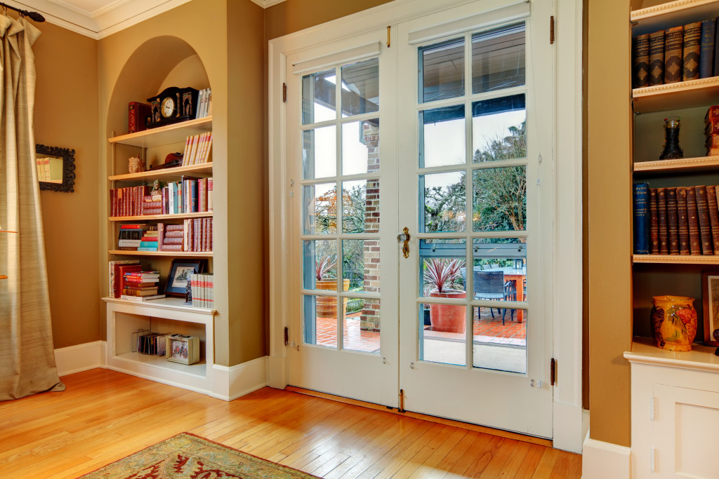 Bookshelves near a door