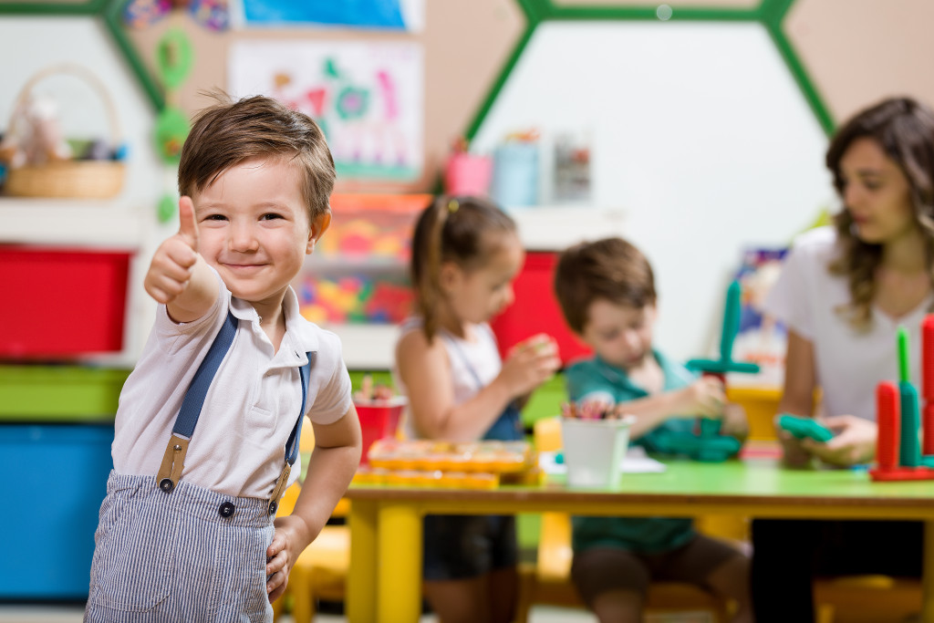 happy little boy in preschool