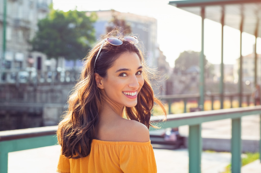 A beautiful woman smiling to the camera